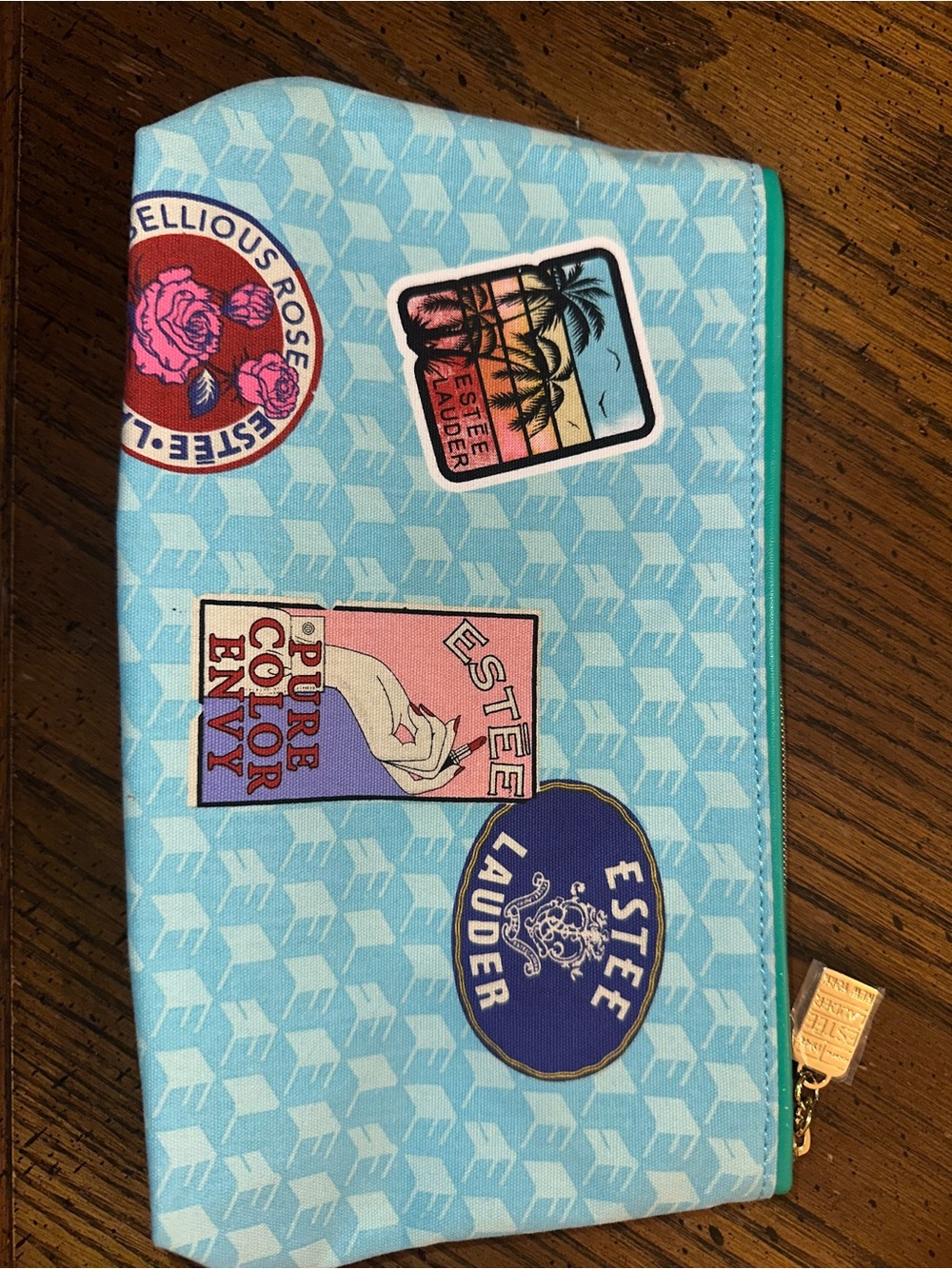Estee Lauder Light Blue Cosmetic Pouch with Travel Graphics